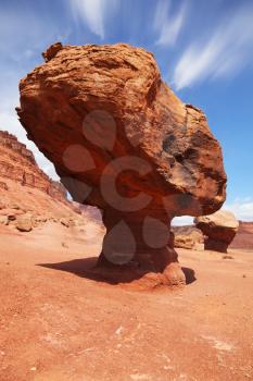 Giant stone mushroom effect of weathering in the red desert of the Colorado River Valley