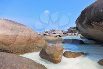  Finest white sand beach between huge black cliffs and azure water. Similan Islands, Andaman Sea, Thailand