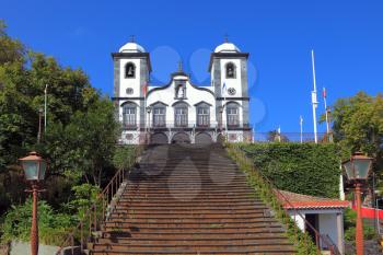 Sights of the Portuguese island of Madeira. To the magnificent white church  the long picturesque ladder conducts