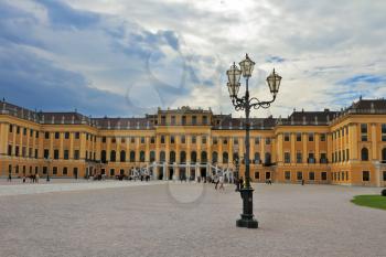 Hofburg - the winter residence of the Austrian Habsburg emperors. Palace and vintage lamps on a large area