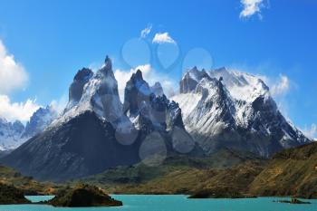 Epic beauty of the landscape - the National Park Torres del Paine in southern Chile. Cliffs of Los Kuernos in cold windy summer day