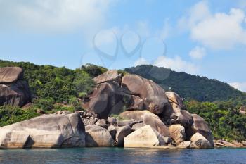 The picturesque shores of magical Similan Islands. Pile of huge rocks 