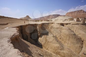 Natural canyons, bluffs and cliffs of sandstone in the desert near the Dead Sea in Israel