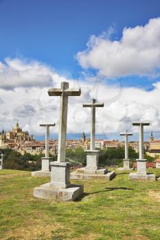 Glade with memorable crosses on a background of Segovia