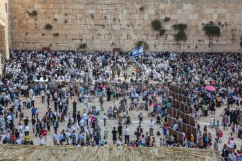 The Jewish holiday of Sukkot,  Jerusalem. The area in front of the Western Wall of the Temple filled with people