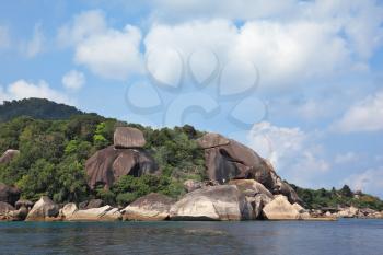 The picturesque shores of magical Similan Islands. Pile of huge rocks