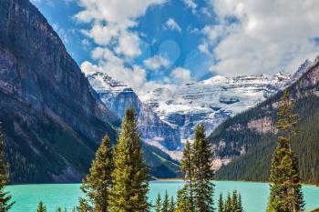Rocky Mountains, Canada, Banff National Park. Magnificent Lake Louise is surrounded by mountain peaks and glaciers. Great sunny day