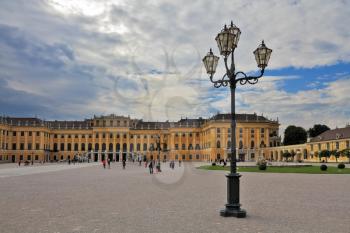 Hofburg - the winter residence of the Austrian Habsburg emperors. Palace and vintage lamps on a large area