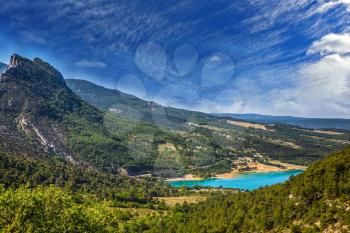 Canyon of Verdon, Provence, May. Magnificent lake with emerald water among wooded hills