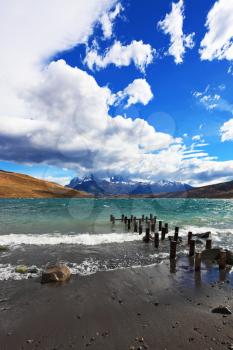 Fabulous lake Lagoon Azul in national park Torres del Paine. In the Chilean Patagonia gale