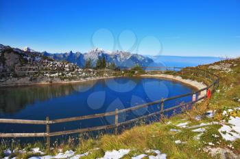 Swiss Alps. A small lake in the mountains on a sunny day