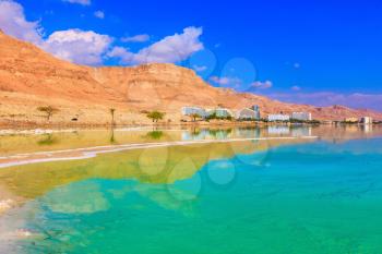 Emerald water of the Dead Sea. The shoaled Dead Sea at coast of Israel