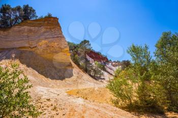 Languedoc - Roussillon, France. Orange picturesque hills. The pit on production ochre