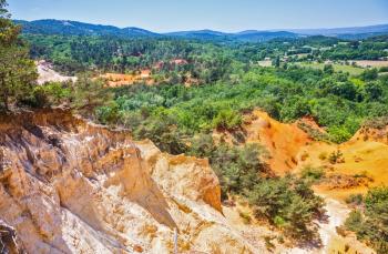 Languedoc - Roussillon, Provence, France. The reserve is in place on the career of ocher mining. Orange and red picturesque hills