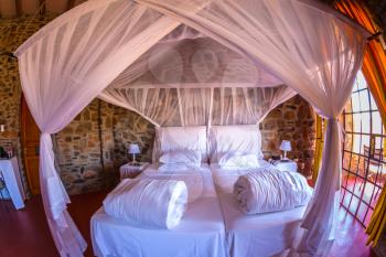 The interior rooms with windows to the east. Hotel fantastic design around the Namib-Naukluft National Park