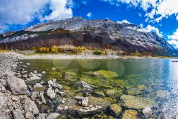 Jasper National Park, Canada. Big mountain beneaped Medicine Lake in the fall