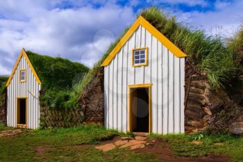 The village ancestors. The reconstituted village - museum of first settlers in Iceland. Roofs of houses covered with turf and grass