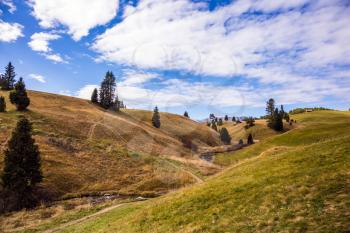 Concept of ecological and active tourism. Well-known international ski resort in the fall. Fabulous mountain valley. The natural landscape of the Alps di Siusi