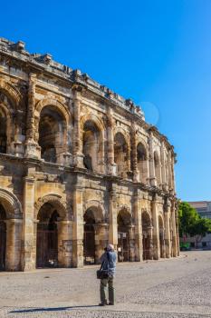Roman arena in Nimes, Provence. Photographer takes old building