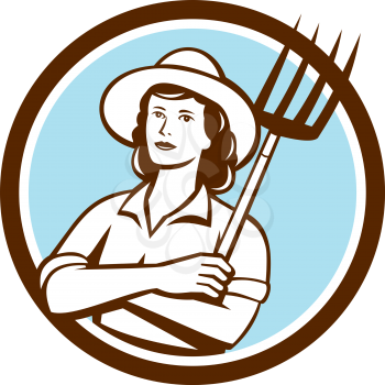 Illustration of a female organic farmer with pitchfork with hat facing front set inside circle on isolated bakcground done in retro style.