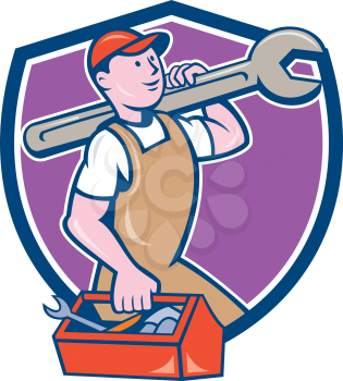 Illustration of a mechanic in overalls and hat holding spanner wrench on shoulder and carrying toolbox facing side set inside shield crest on isolated background done in cartoon style.