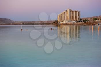 Royalty Free Photo of Early Morning on the Dead Sea and Buildings in the Background