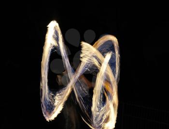 fire tracks on a long exposure during the fire show