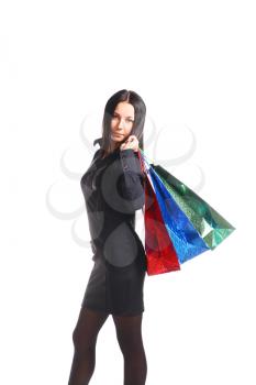 Happy shopping woman with bags- isolated over white