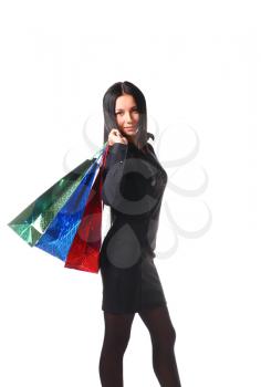 Happy shopping woman with bags- isolated over white