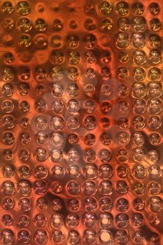 copper metal background cowered with dots