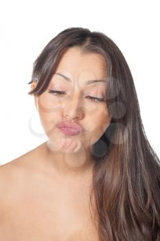 Brunette girl making funny face on white background. Joy concept