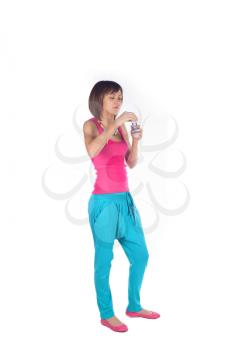 Portrait of a young 20s girl blowing soap bubbles full body on white