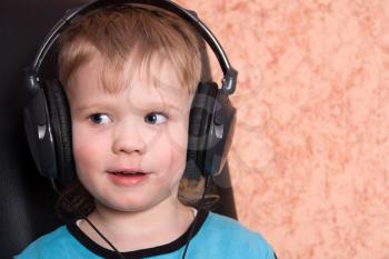 Royalty Free Photo of a Boy Wearing Headphones