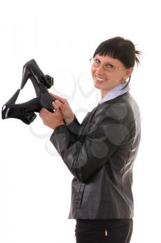 Royalty Free Photo of a Businesswoman Holding Shoes