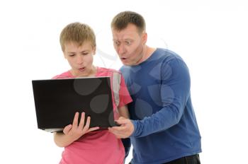 Royalty Free Photo of a Father and Son Holding a Laptop
