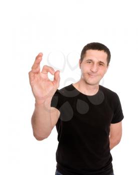 man in black t-shirt is showing sign ok isolated on white background