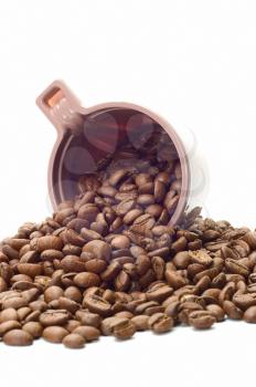 Royalty Free Photo of a Cup Full of Coffee Beans