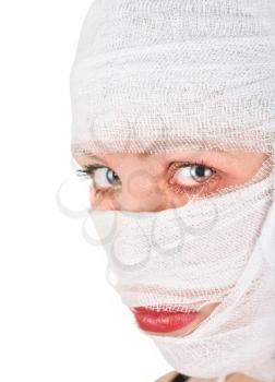 Royalty Free Photo of a Woman With Bandages on Her Face