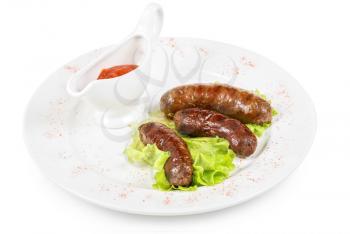 Royalty Free Photo of Grilled Venison Sausage With Sauce