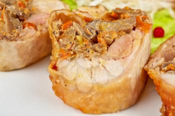 Chicken rolls with champignons and vegetables