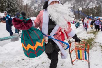 BYURIZOVAYA KATUN. ALTAISKIY KRAI. WESTERN SIBERIA. RUSSIA - DECEMBER 1, 2018: Fathers Frost (Russian Santa Claus) take part in the Santa Run in the Altaiskaya Zimovka holiday - the first day of winter on December 1, 2018 in Altayskiy krai, Siberia, Russia.