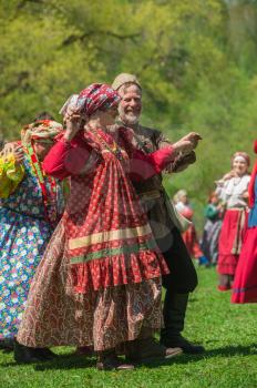 TOPOLNOE, ALTAY, RUSSIA - May 27, 2018: Folk festivities dedicated to the feast of the Holy Trinity. Ancient Russian rite: traditional dances.