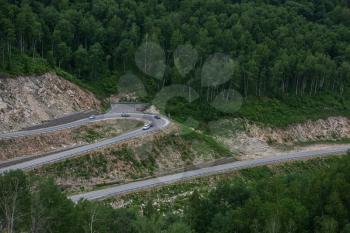 Winding road in the mountains, drone shot. Altai Krai, Western Siberia, Russia. Road to Resort town Belokurikha 2