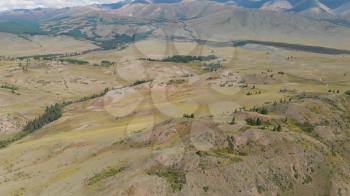 Aerial video of the Kurai steppe between the Kurai and the North Chuia Ranges in the south-eastern Altai, Siberia, Russia