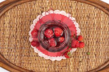 Strawberry jam with fresh strawberries