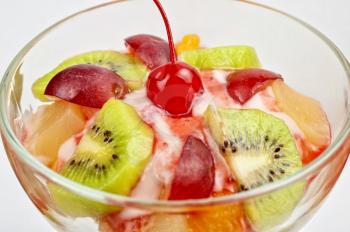 Fruit salad with ice cream in plate 