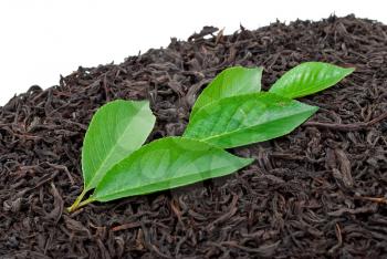 Black tea with leafs 