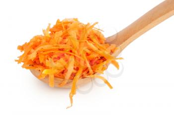 Grated carrots in a wooden spoon