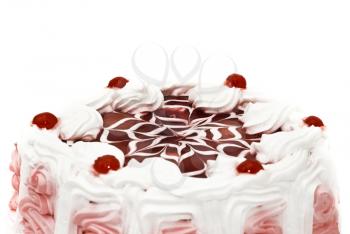 Beautiful dessert - iced cake with cherries and beautiful red pattern