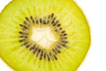 Tasty, green and fresh - closeup of kiwi fruit slice